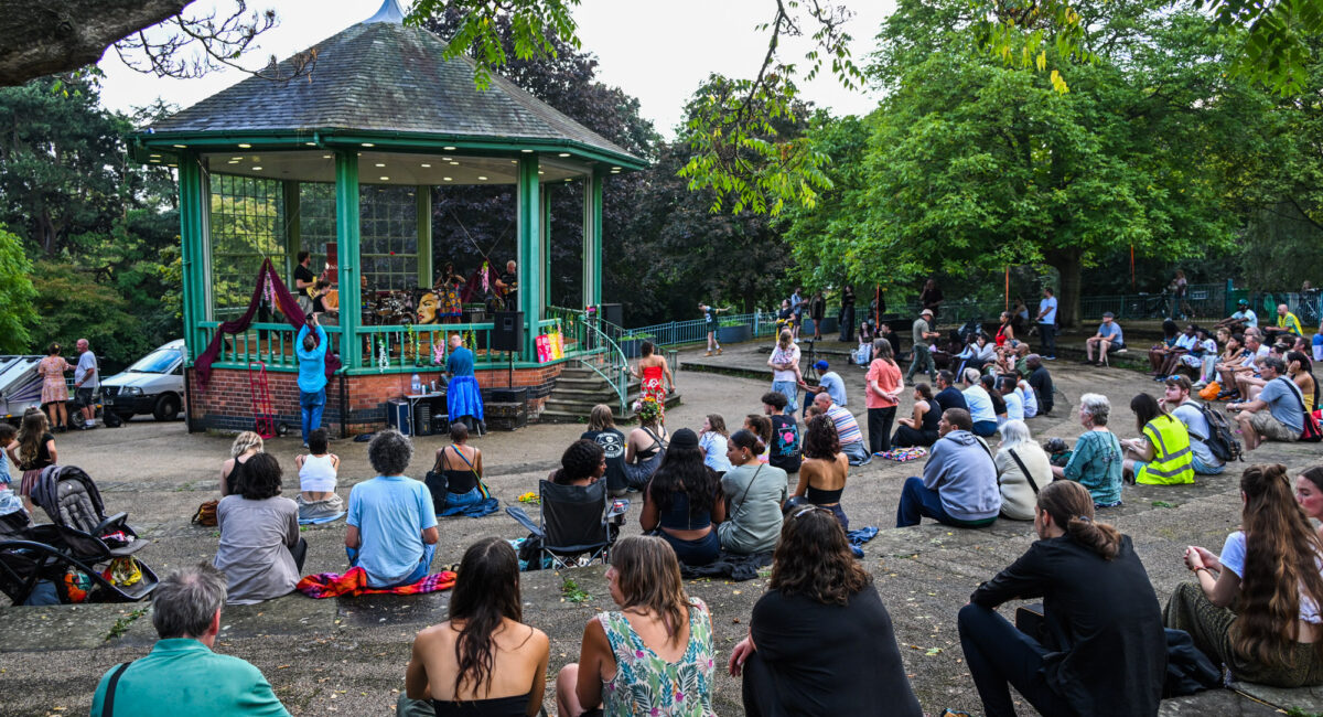 The bandstand with live music at Nottingham Green Festival in the aboretum